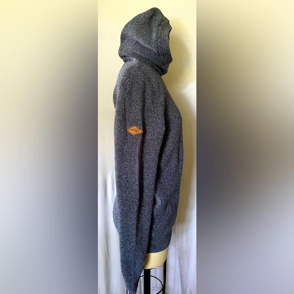 Superdry. Men’s medium but fits small. Blue grit color.